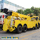 HOWO 12wheels Heavy Duty Rotator Tow Truck Mounted Rotary Crane manufacturer