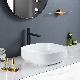 Newest Arrival Artistic Bathroom Sink Ceramic White Color Hand Art Wash Basin manufacturer