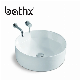 China Factory Bathroom Artistic Sinks Ceramic White Washing Basin Sanitary Ware manufacturer